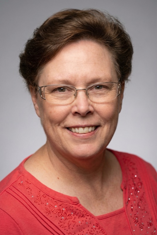 Polished professional headshot after editing
